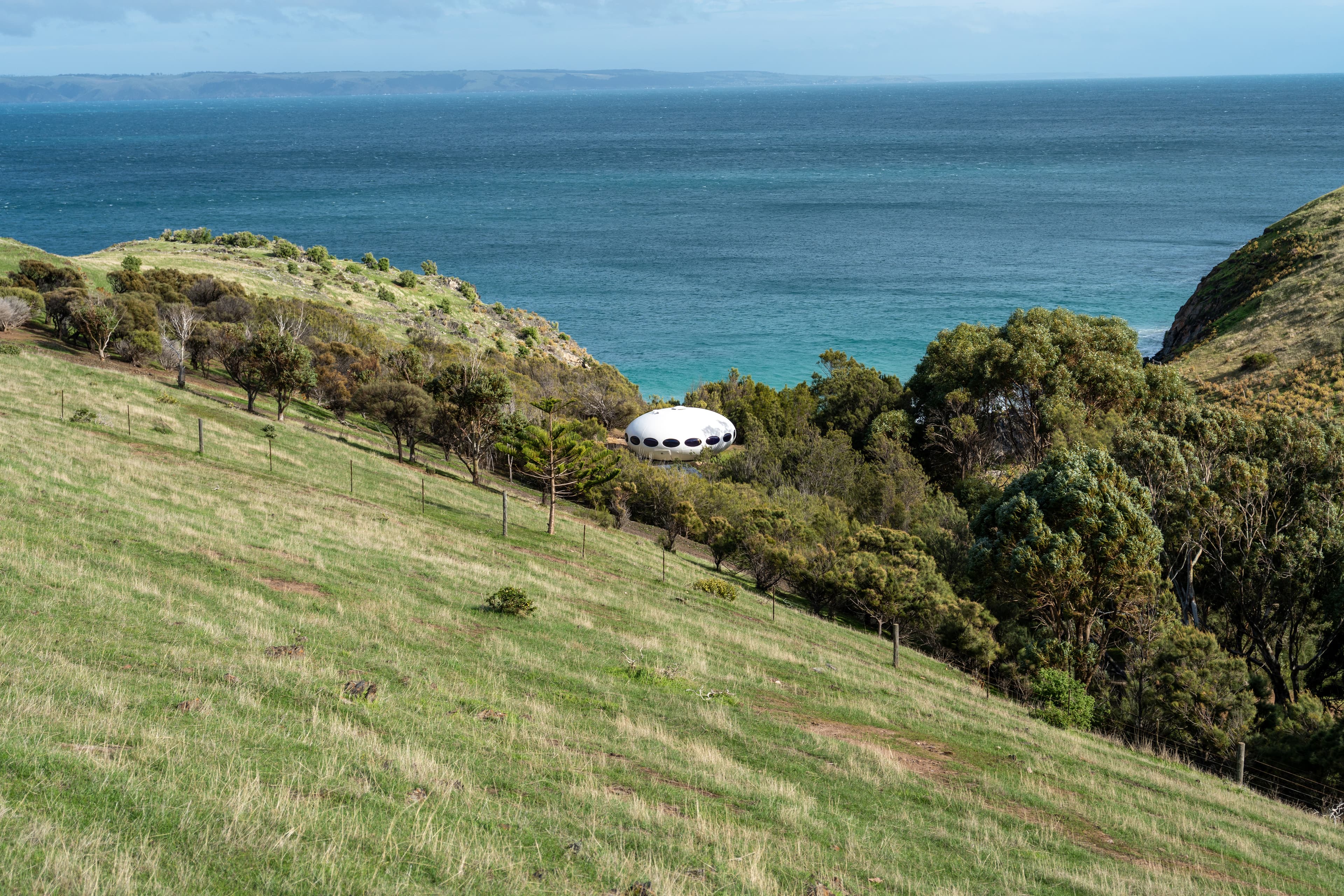 Another view of the quaint UFO house with Kangaroo Island in the background. What a cool spot.
